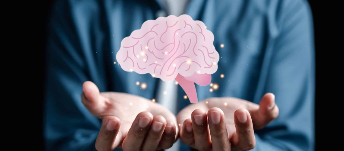 Hand holding virtual human brain icon, idea creative intelligence thinking or Awareness of Alzheimer, Parkinson's disease, dementia, stroke, seizure or mental health. Neurology and Psychology care.